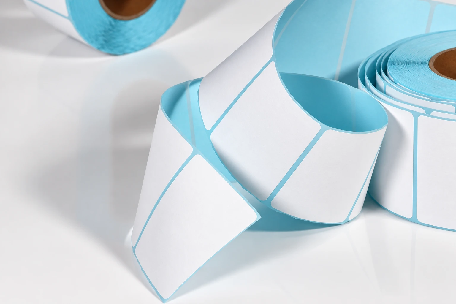 White die-cut labels on blue release liner
