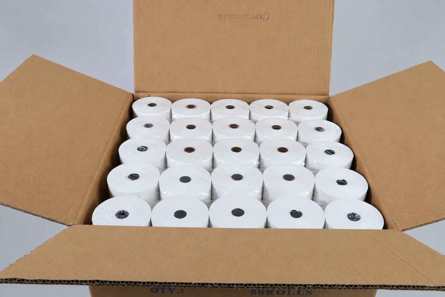 Individually wrapped receipt-paper rolls arranged in an open corrugated carton